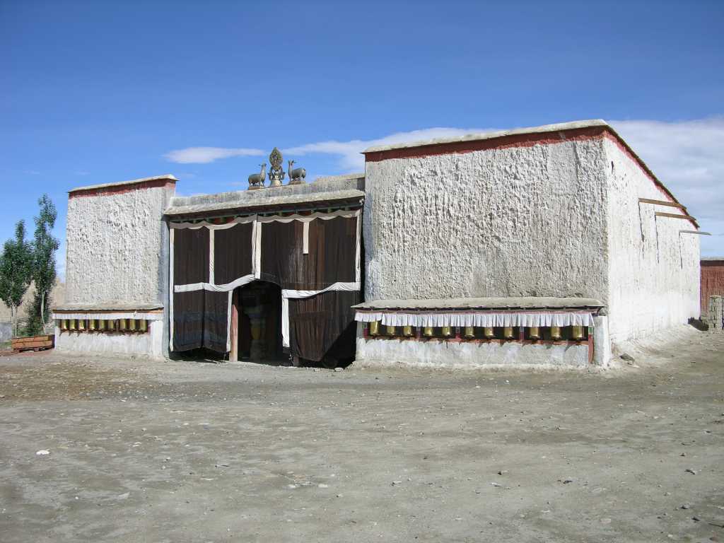 Tibet Guge 03 Tholing 05 White Temple Outside Tholing's 15C White Temple (Lhakhang Karpo) is a large hall whose walls are covered with splendid paintings dating back to 15-16C. Luckily this building was not destroyed by the Chinese during the Cultural Revolution, as it was used as a storage room for grain and other supplies.